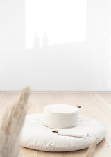 meditasjonspute zafu zabuton hvordan meditere guidet meditasjon norsk rund sittepute økologisk bomull hvit